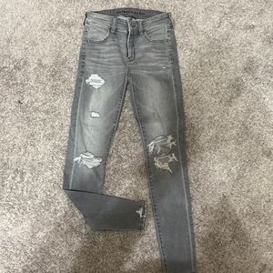 American Eagle grey skinny jeans with rips